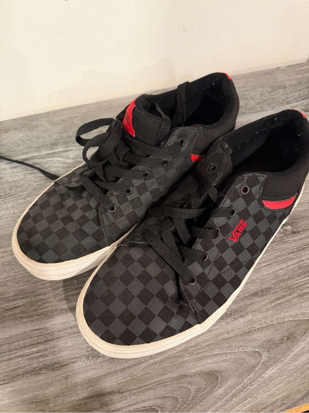 Vans Kids Black Checkerboard Sneakers with Red Accents